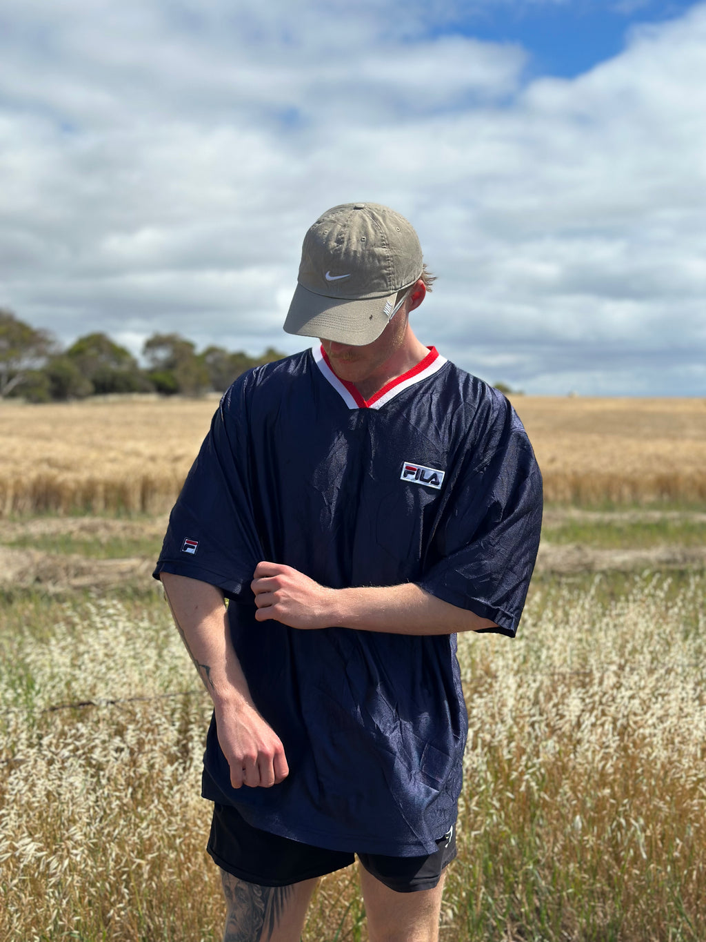 Vintage 90's Fila Mesh Embroidered Tee (XL)